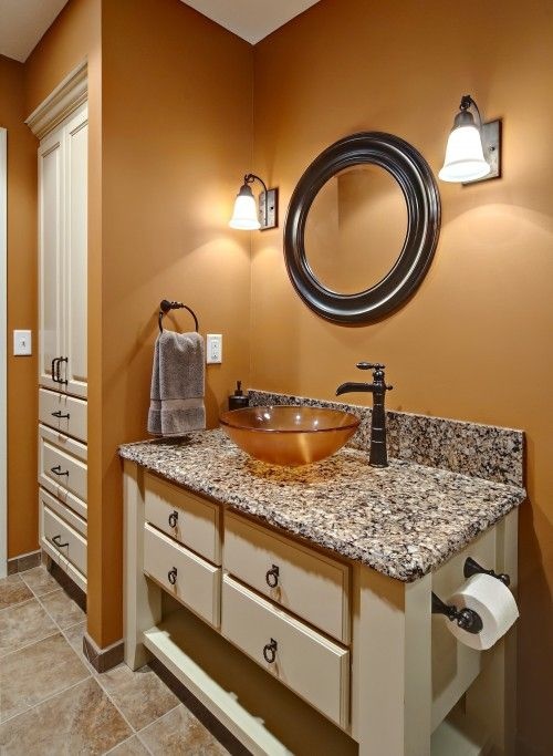 البرتقالي من أجمل الألوان التي يمكن اختيارها لدهان جدران الحمام، استعدادا لفصل الخريف