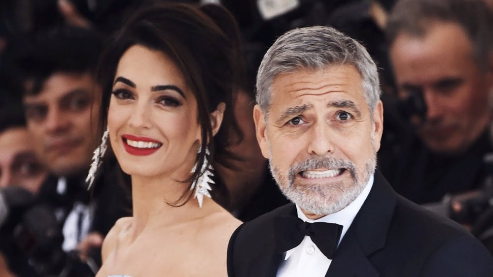  أزمة في زواج أمل (Amal Clooney) وجورج كلوني (George Clooney) بسبب فضيحة إنجابه لطفل غير شرعي