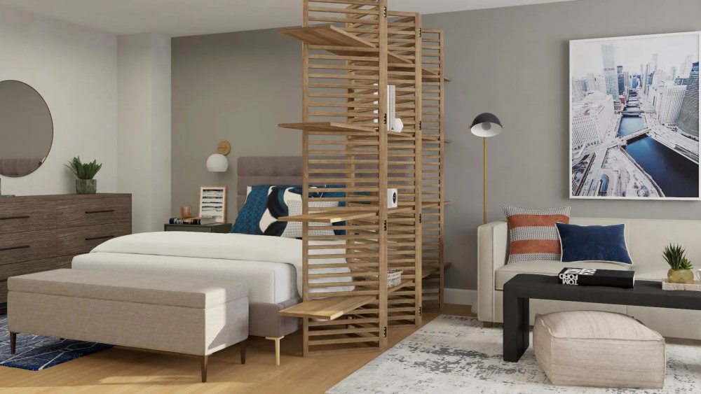 تصميم مودرن لحاجز خشبي يوفر مساحة غرفة جلوس ضمن ديكور غرفة النوم