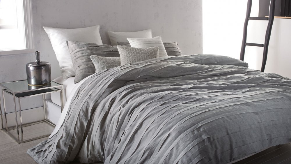 ⁨مفارش سرير من القطن الطبيعي بتوقيع DKNY