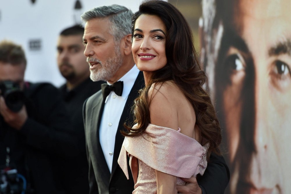 جورج (George Clooney) وأمل كلوني (Amal Clooney) يخططان لتبني طفلة صغيرة