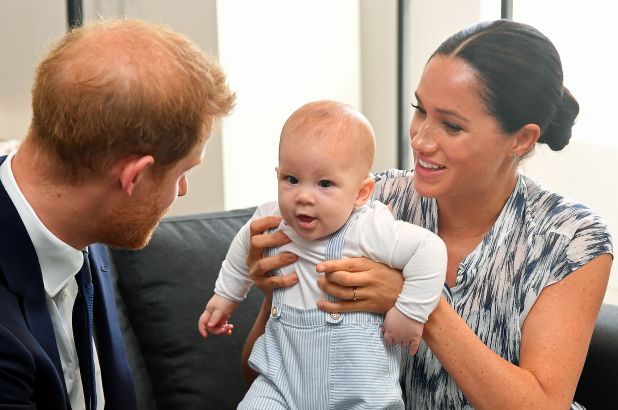 الأمير هاري مع زوجته وابنهما