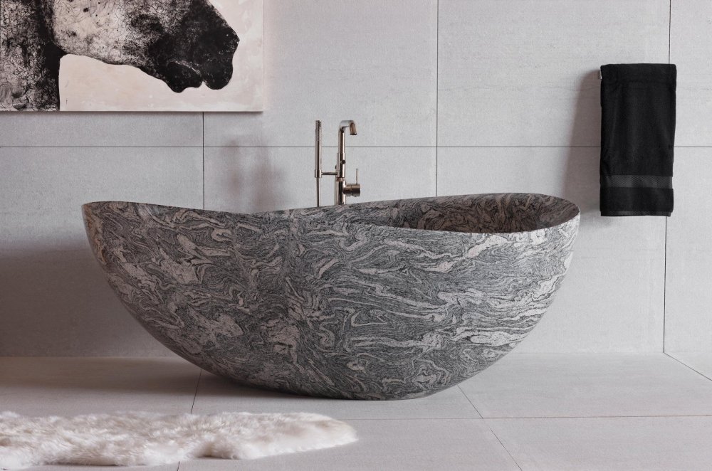 ‎⁨تصميم حوض استحمام من Stone Forest بأسلوب فني مميز