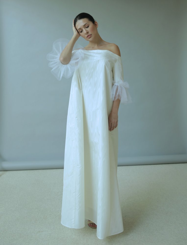  فستان Moiré من المجموعة الأولى للمصممة نورا سليمان المصدر نورا سليمان