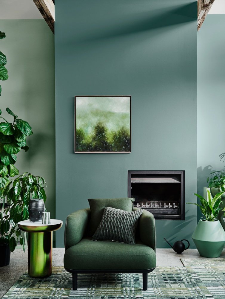 ديكورات غرفة معيشة بلمسات من اللون الأخضر